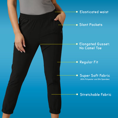 Women's Solid Training Black Track Pants with Elasticated waist & Pockets.