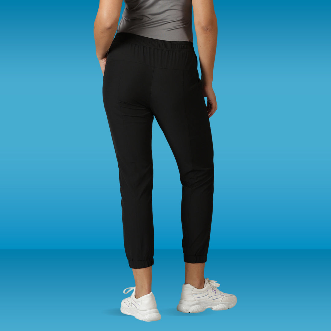 Women's Solid Training Black Track Pants with Elasticated waist & Pockets.