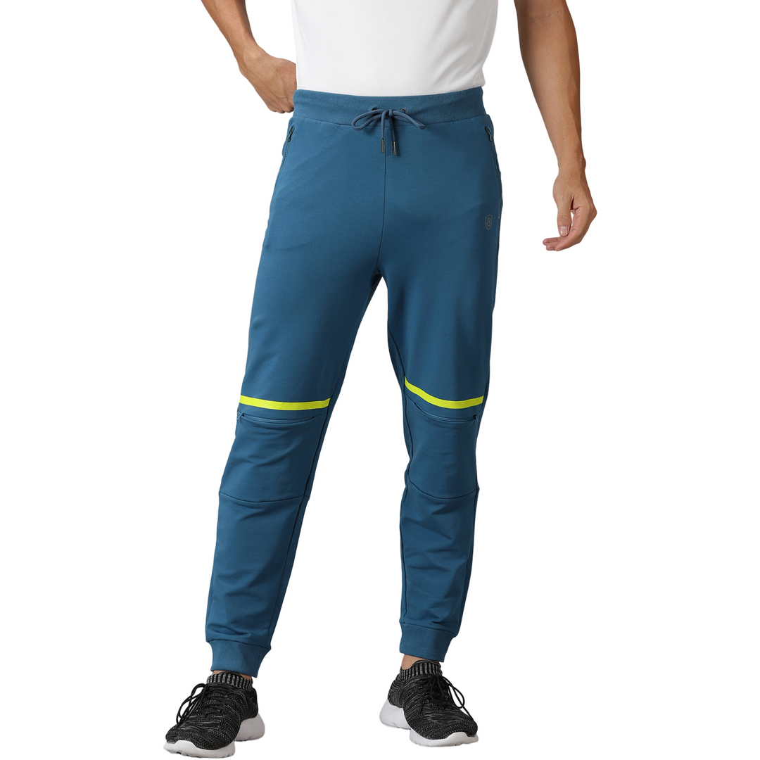 Men's solid Training Track pants with Drawstring waist & Zipper pockets.