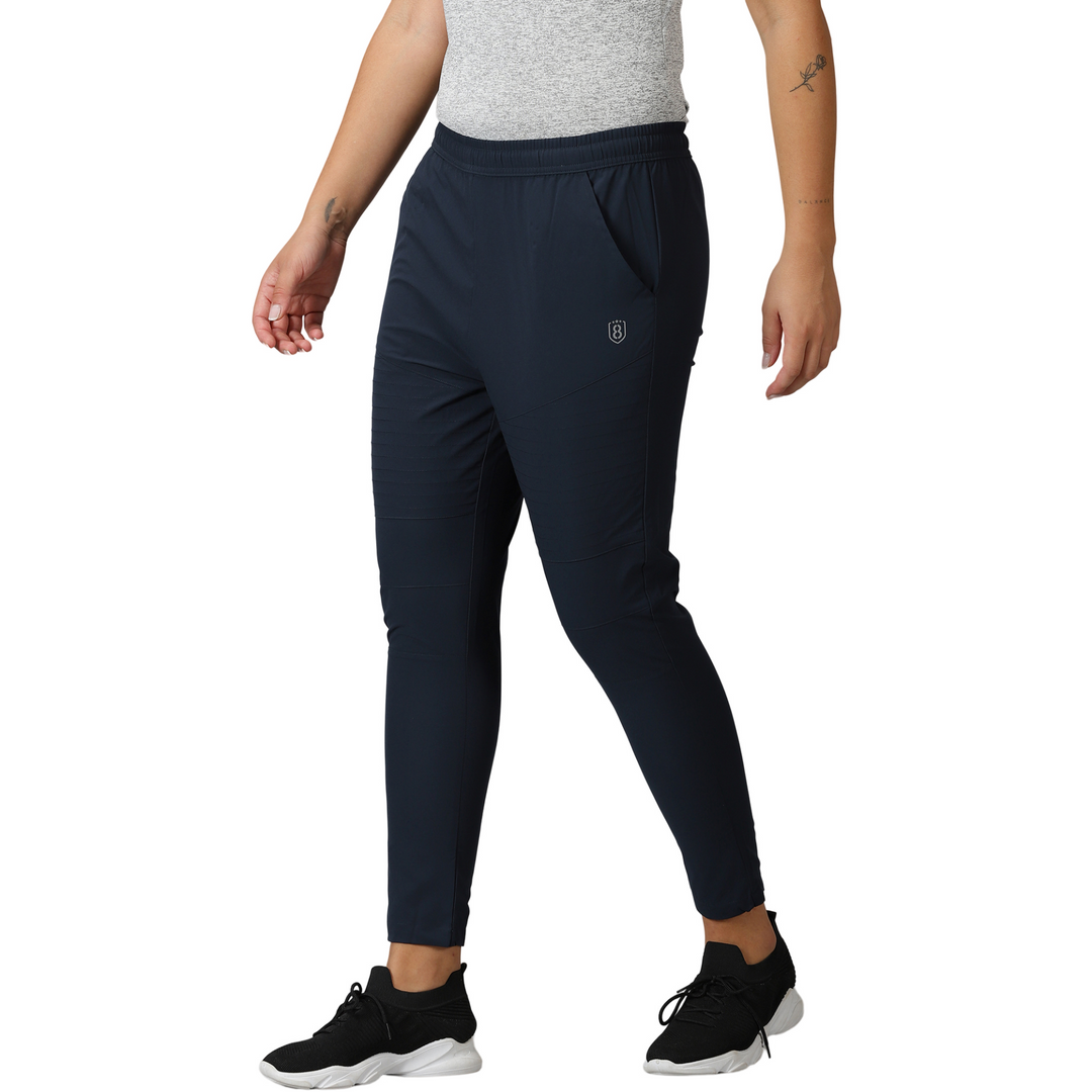 Women's Solid Training Track Pants with Drawstring waist & Slant pockets.