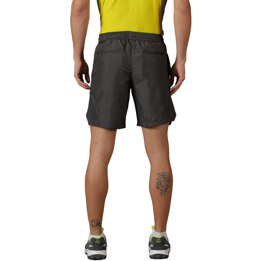 Men's solid Training shorts with Elasticated waist & Zipper pockets.