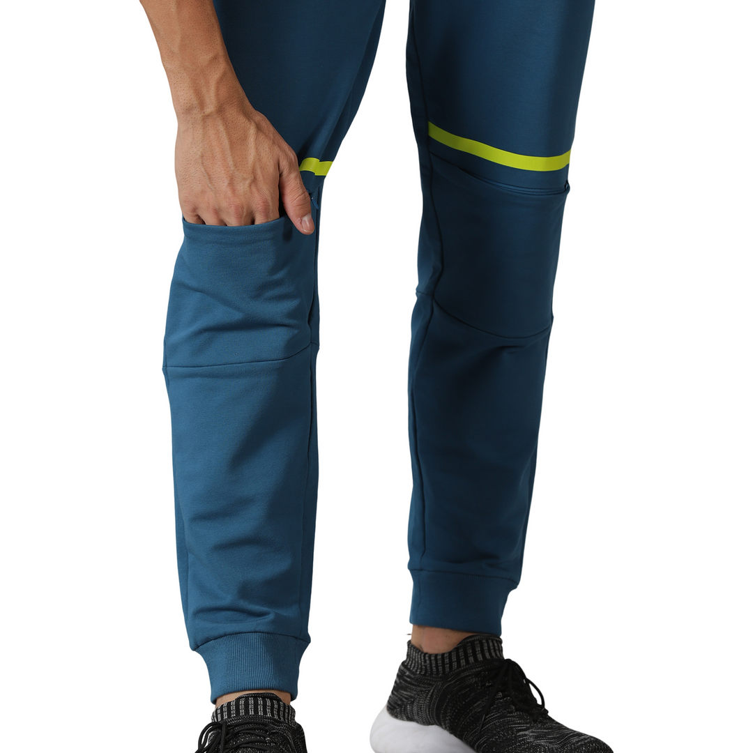 Men's solid Training Track pants with Drawstring waist & Zipper pockets.