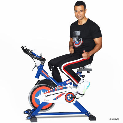 MB-165 Captain America Edition Exercise Spin Bike With 13KG Flywheel | iPad & Bottle holder | Adjustable handle with Handgrips and Heart Rate Sensors For Home Workout | blue